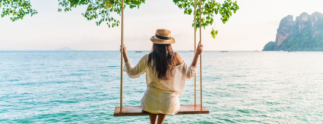 traveler woman relaxing swing above andaman sea railay beach krabi leisure tourist travel phuket scaled