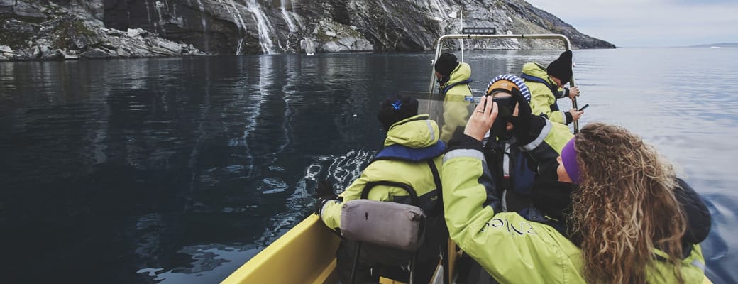 Gr&oslash;nland nuuk water taxi stopping waterfall. photo peter lindstrom greenland scaled
