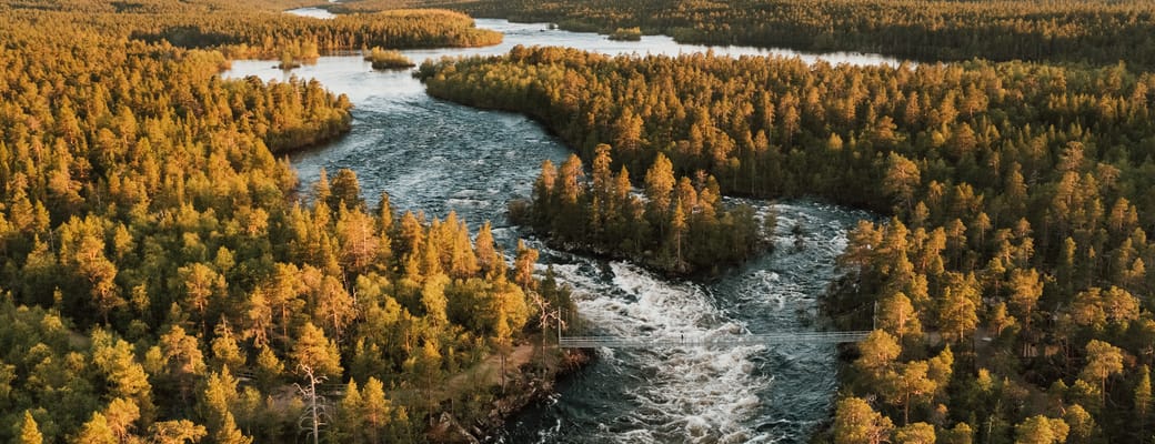 finland Lapland wilderness hotels autumn juutua flod