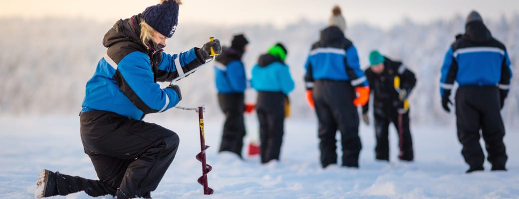finland Lapland wilderness hotels icefishing scaled