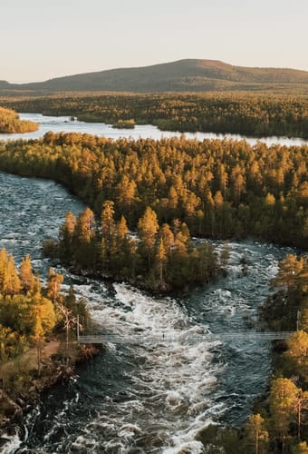 finland Lapland wilderness hotels autumn juutua flod