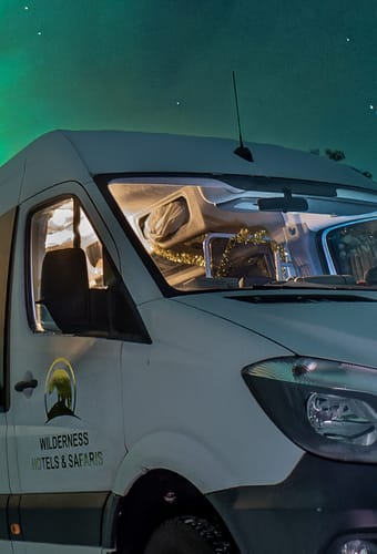 finland Lapland wilderness hotels aurora hunt car scaled