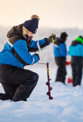 finland Lapland wilderness hotels icefishing scaled