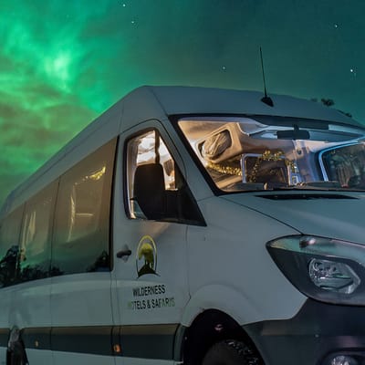 finland Lapland wilderness hotels aurora hunt car scaled