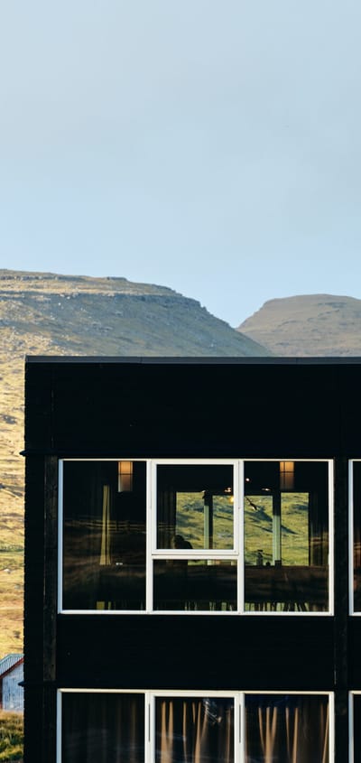 faroe island vagar exterior view mountain scaled hotel