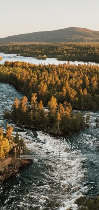 finland Lapland wilderness hotels autumn juutua flod