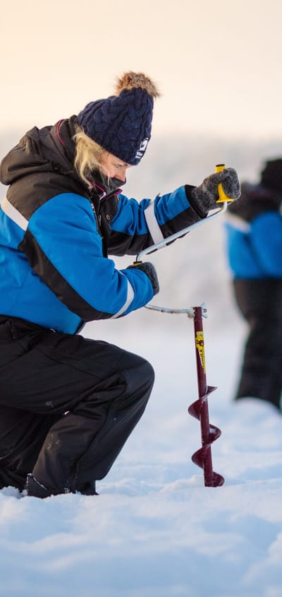 finland Lapland wilderness hotels icefishing scaled