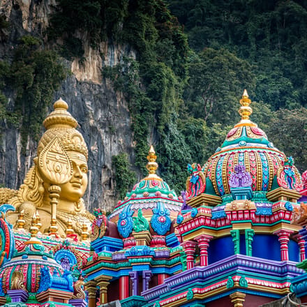 Malaysia Kuala Lumpur Lumpur golden buddha batu caves istock