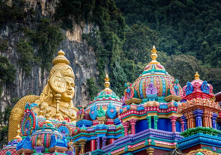 Malaysia Kuala Lumpur Lumpur golden buddha batu caves istock