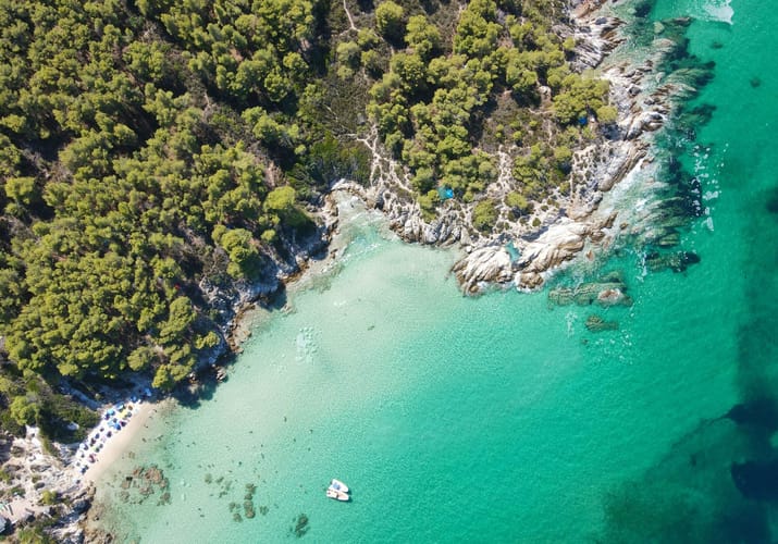 view from above the majestic beach kavourotrypes located sithonia halkidiki greece dimitris kiriakakis unsplash scaled